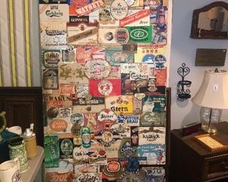 MAN CAVE ALERT! An interior door completely covered in beer labels!!