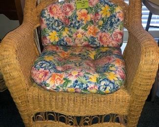 Cute wicker rocker with cushions!