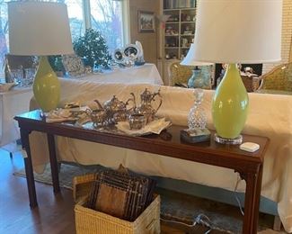 Console table, glass lamps