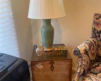 Small chased brass top chest, ceramic lamp