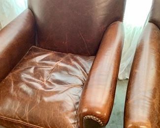 Pair of Restoration Hardware 1920's Style French Camelback Leather Club Chairs

Color: Cocoa 

Leather: Italian Brompton 

Some natural wear which provides a nice distressed look. These chairs were originally $1,516/each