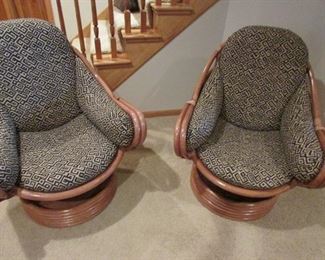 Vintage Rattan Swivel Rocking Lounge Chairs. Love these chairs.