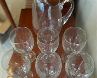 Glass pitcher and drinking glasses