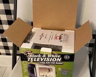 Portable B/W TV with AM/FM Radio.