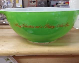Rare Pyrex green Merry Christmas and Happy New Year mixing bowl in great condition.,