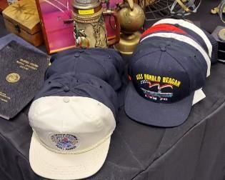 Various Navy ball caps, stein, brass eagle bank