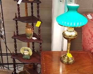 Corner etagere, torchiere floor lamp, brass table lamp with green glass shade
