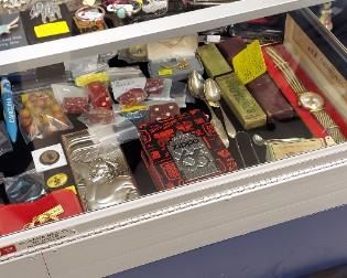 More sterling jewelry, watches and arrow heads. Gold and estate jewelry is available during sale hours -- not kept on the premises during non-sale hours. 