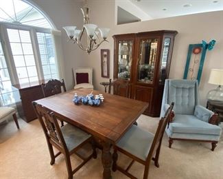 Gorgeous Antique Dining Table with Built-In Leaves and Four Matching Chairs, Lighted China Cabinet with Beveled Glass.