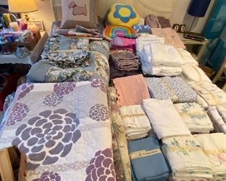 Lots of quality bedding and Quilts, Queen Size Bed frame with Mattresses