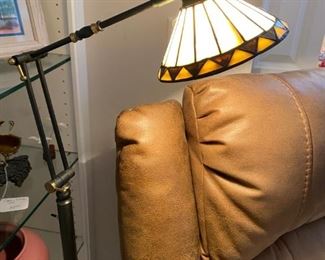 Close Up of Tiffany Style Swing Arm Lamp with the Light on