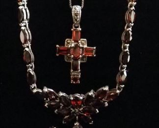 Sterling Silver Jewelry, Includes Necklace With Floral Design, Necklace With Cross, And 2 Rings, All With Reddish Yellow Stones