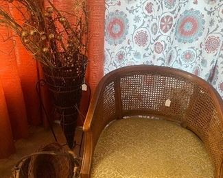 Antique barrel chair.
Rattan vase and baskets