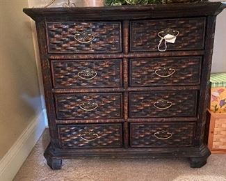 Pretty 8 drawer chest.  Dark woven- look rattan 