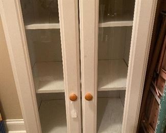 Linen cabinet 
Could be used in a bathroom for towels, toilet paper, etc.  
could be used in laundry area to store laundry supplies.   Also could be a food pantry.  
