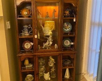 Lighted curio cabinet
Glass door in the center top and center bottom