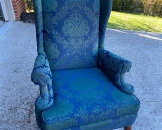 Bluish green wingback chair