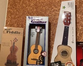 assortment of guitar toys
