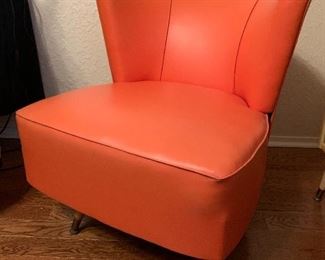 ADORABLE orange/clementine upholstered vintage swivel chair 