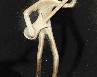 metal guitar player figurine