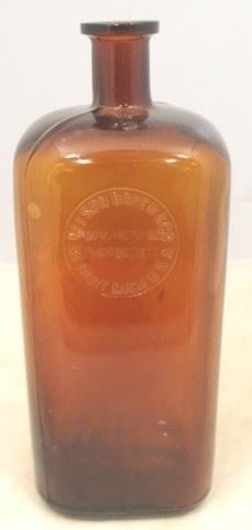 52 - Nelson Baker Amber Glass Bottle 12" tall