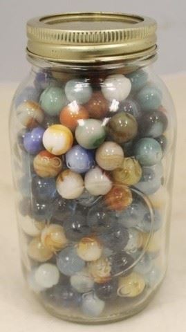 64 - Mason Jar Full of Marbles Quart 7 1/2 tall
