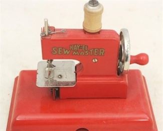 139 - Kay-ee Sew-Master Toy Sewing Machine 4 1/2 x 7 x 6 1/2