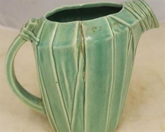 215 - McCoy Pottery Pitcher - AS IS - Cracked 8" tall
