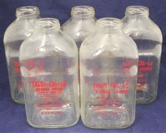 284 - Lot of 5 Tropi-Cal-Lo Glass Bottles 9 3/4" tall
