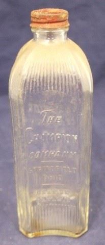 306 - Antique Champion Glass Bottle 8 1/2 tall
