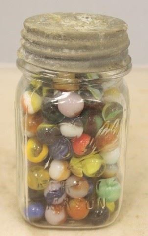 717 - Ball Mason Jar Full of Marbles 5 1/2 tall