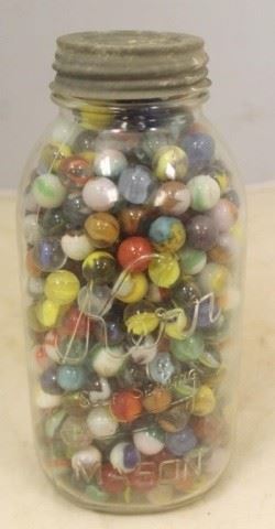 732 - Ker Mason Jar Full of Marbles 7 1/2 tall

