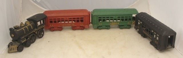 745 - 4pc. Cast Iron Train Set Locomotive w/ 3 Cars