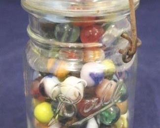 759 - Ball Mason Jar Full of Marbles 5 1/2 tall
