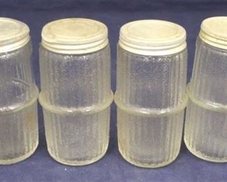 852 - 4pc. Vintage Glass Hoosier Jars 4 1/4 tall
