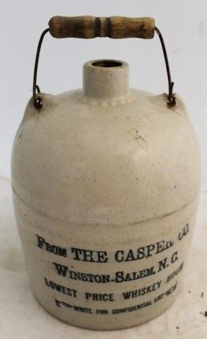 1086 - Casper Co stoneware liquor jug w/ handle 11 1/2" tall
