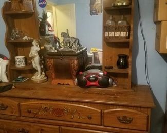 Dresser with mirror plus various items: oil lamp, lamp, glass statue of woman