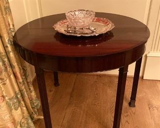 Vintage demi lune drop leaf accent table with straight fluted legs, as shown in open round position, 36Dx28H