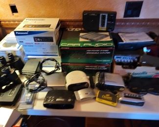 Electronics, many new car audios in boxes.
