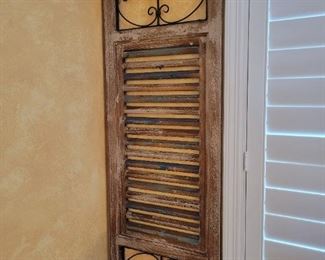 A pair of decorative shutters.