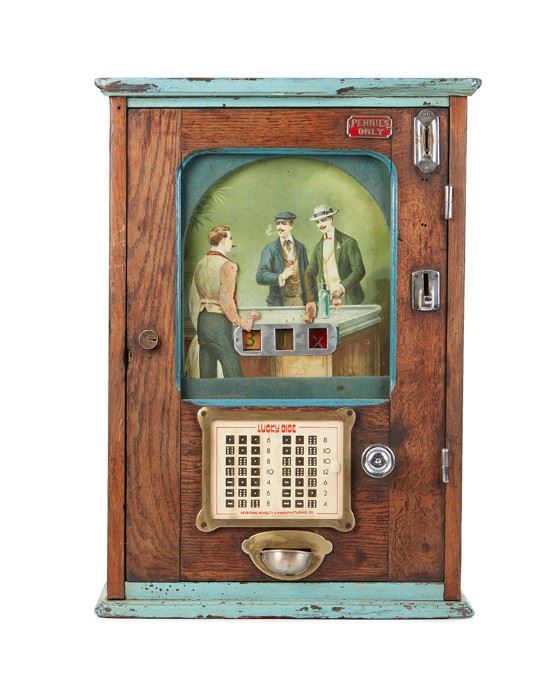 1001
A Keystone Novelty & Mfg. Co. "The Domino" Slot Machine
Circa Late 1920s
"The Domino," or "Lucky Dice," coin-op slot machine with painted metal panel depicting three automata figures centering three reels, set behind a glazed door in a oak case with painted accents
24.5" H x 17.25" W x 9.5" D
Estimate: $500 - $700