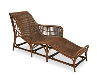 1005
A Dryad Cane Chaise Lounge
First-Quarter 20th Century
The woven wicker and cane chaise lounge with curved seat and straight arm rest, with various woven designs
34" H x 68" W x 22" D
Estimate: $600 - $800