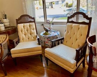 2 cane arm chairs