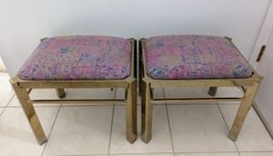 Pair of Vintage Brass Stools. Both have some wear on the brass paint that can be seen in the photos. Each measures 20” wide, 15” deep and 17” high.