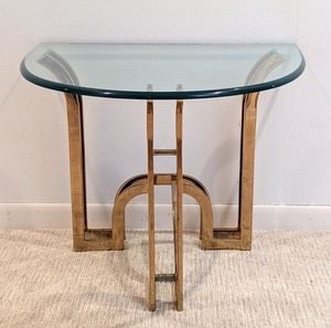 Vintage Brass Contemporary Glass Topped Accent Table. There is some light wear on the brass finish, but in overall great condition. Measures 22” x 28” and 22” high