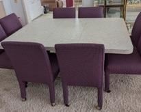 Formica Dining Table and Colorful Chairs. The is a few light spots on several chairs, but the set is in otherwise excellent condition. The table is pictured with the removable leaf and measures 48” x 65” and 29” high. Each chair measures 21” wide, 17” high to the seat and 34” high to the chair back. 