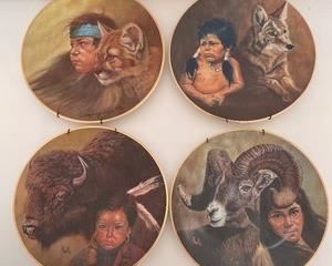 These Native American collectors plates by Gregory Perillo each measure 8 inches in diameter.