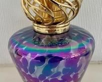 What brilliant colors! This art glass oil candle measures 7 inches tall.