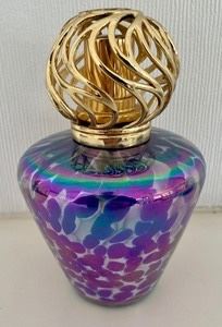 What brilliant colors! This art glass oil candle measures 7 inches tall.