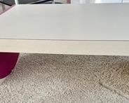 This contemporary coffee table measures 42x30x18 inches.